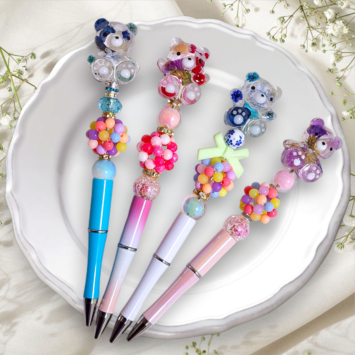 EGGNWORKS エッグンワークス ツクルヒトタチ •キーホルダー
•ヘアゴム
•ピアス
•イヤリング
•アンブレラマーカー
•ボールペン
•ノート　MIYO